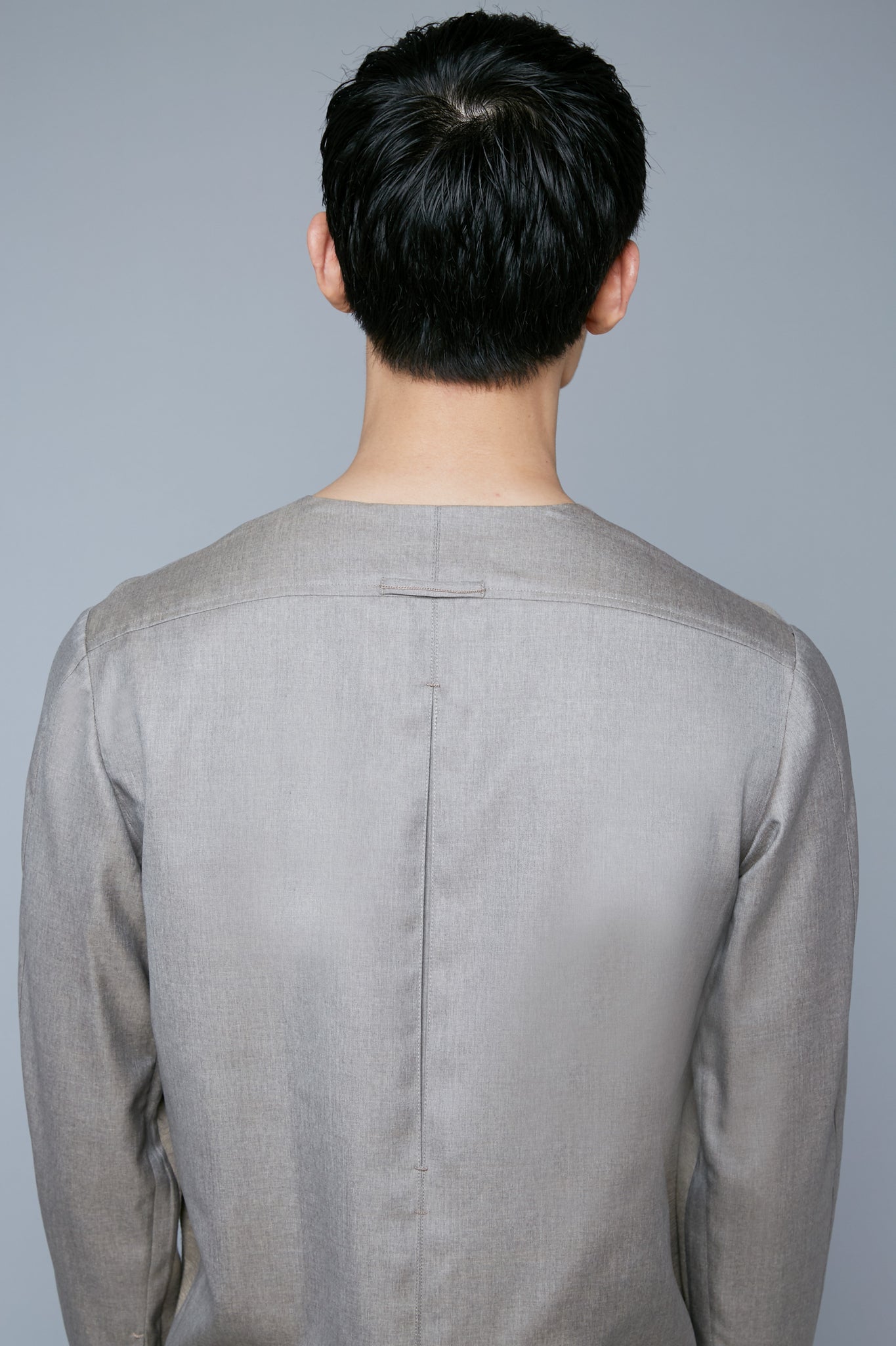 Back View: Model Qiang Li wearing Woven Henley