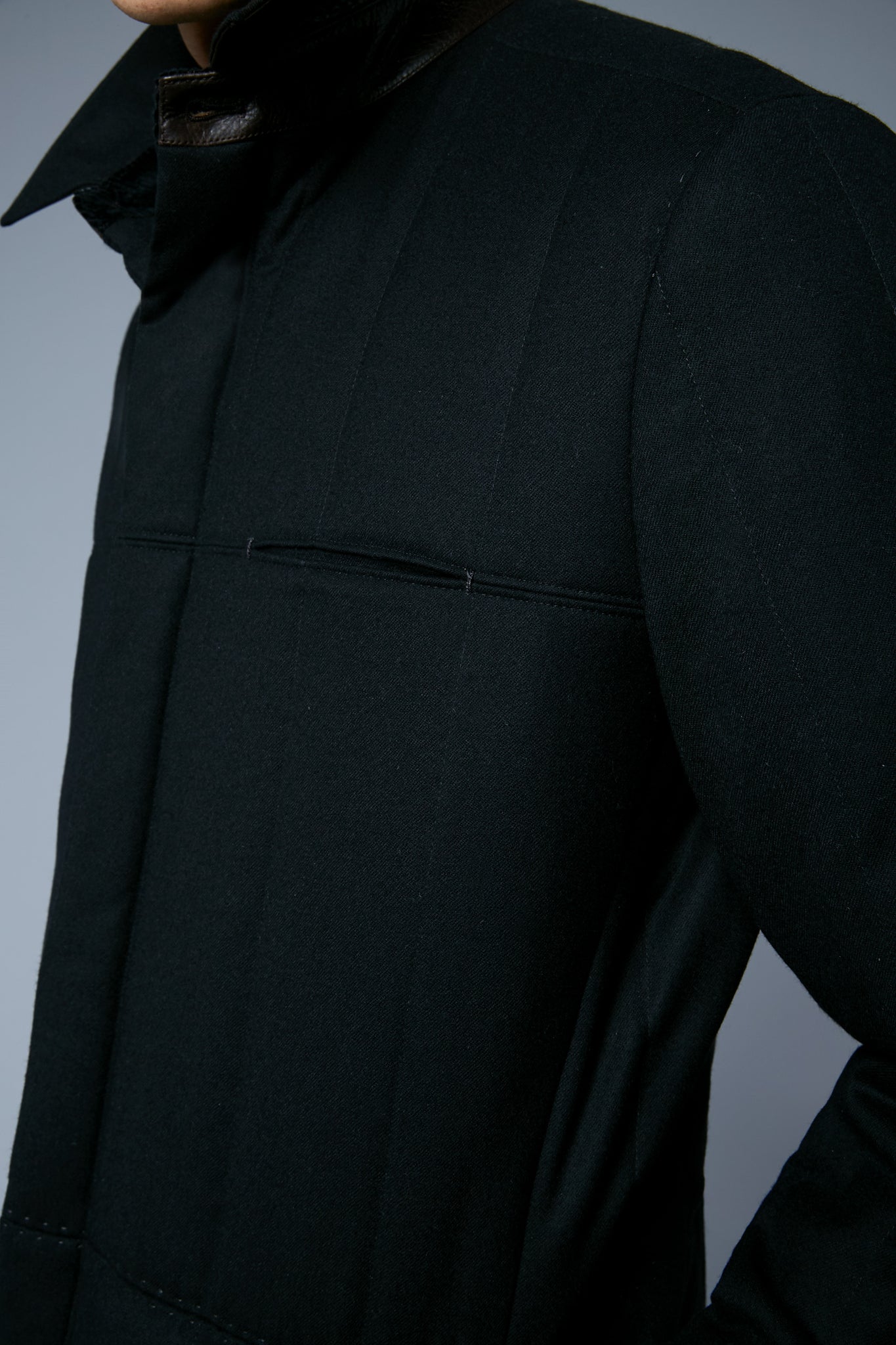 Detail View: Model Qiang Li wearing Down Téchin Jacket