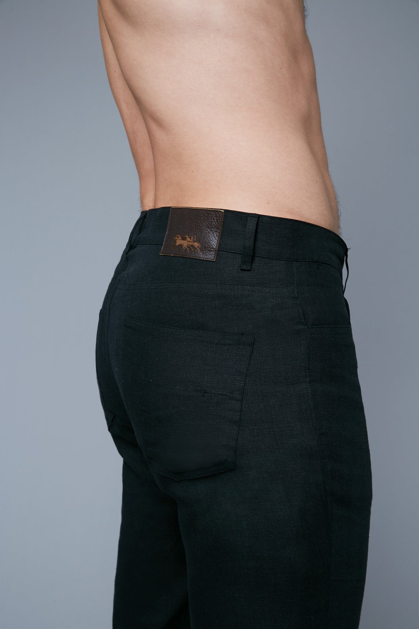 Detail View: Model Milos Drago wearing Linen 5 Pocket Pants