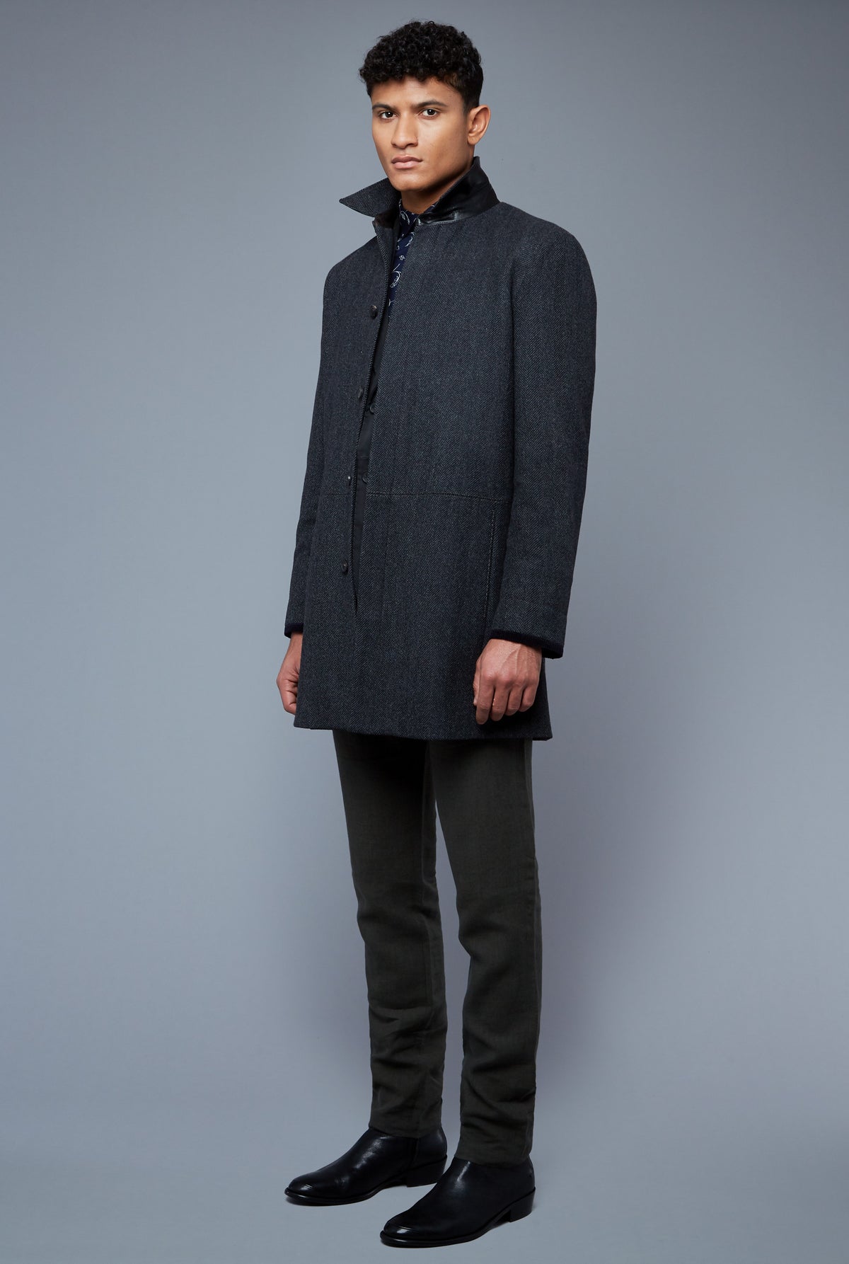 Three Quarter View: Model Tre Boutilier wearing Téchin Coat