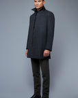 Three Quarter View: Model Tre Boutilier wearing Téchin Coat