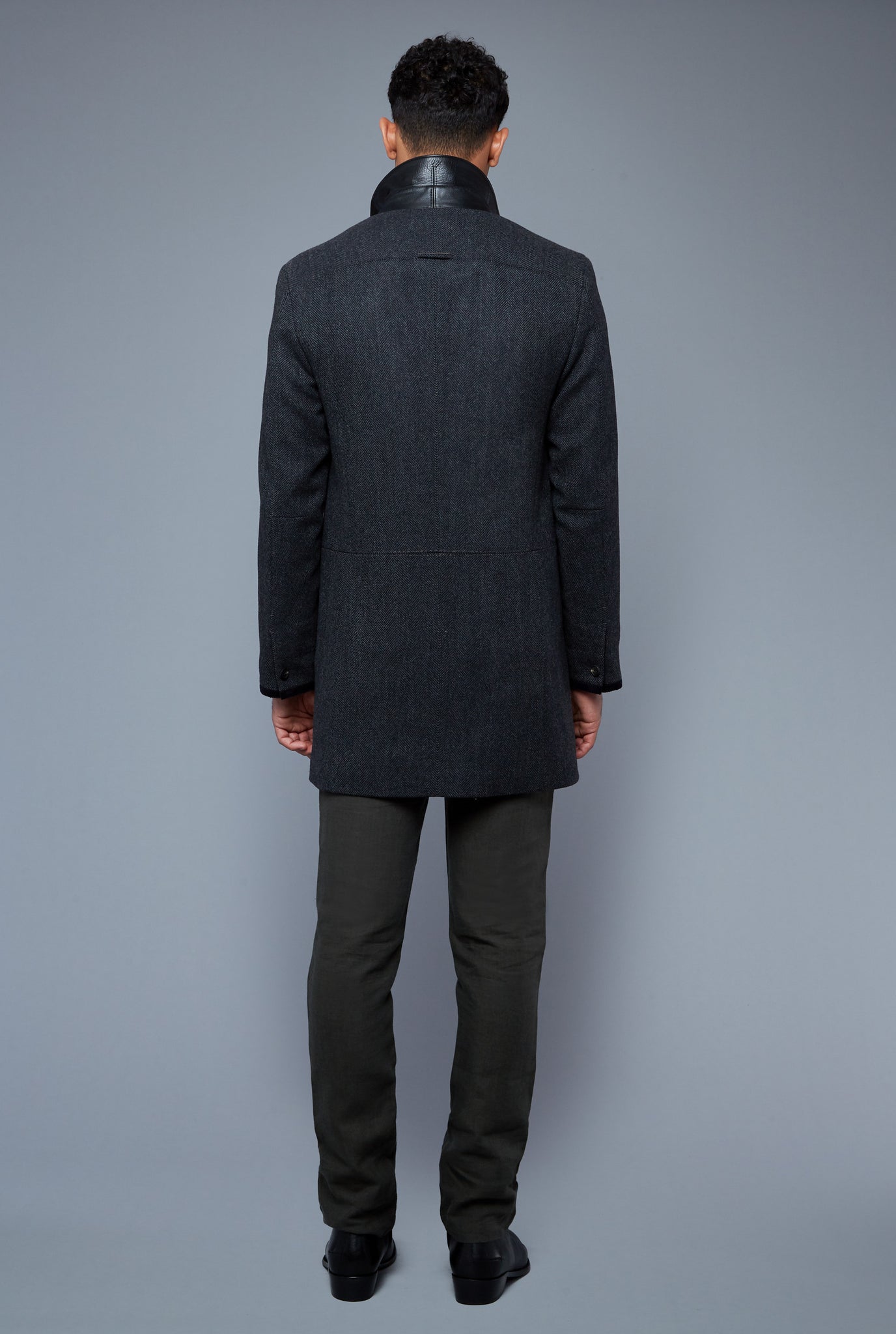 Back View: Model Tre Boutilier wearing Téchin Coat