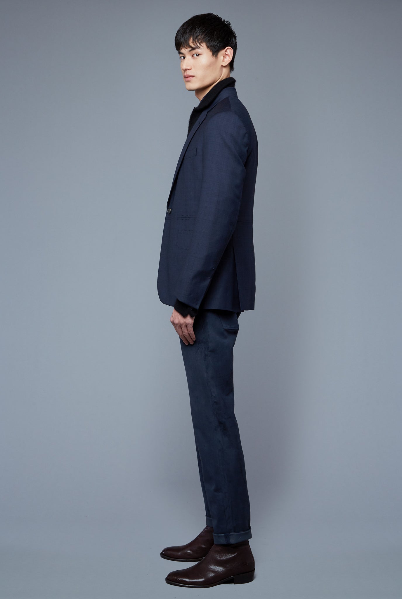Side View: Model Qiang Li wearing Notch Lapel Jacket