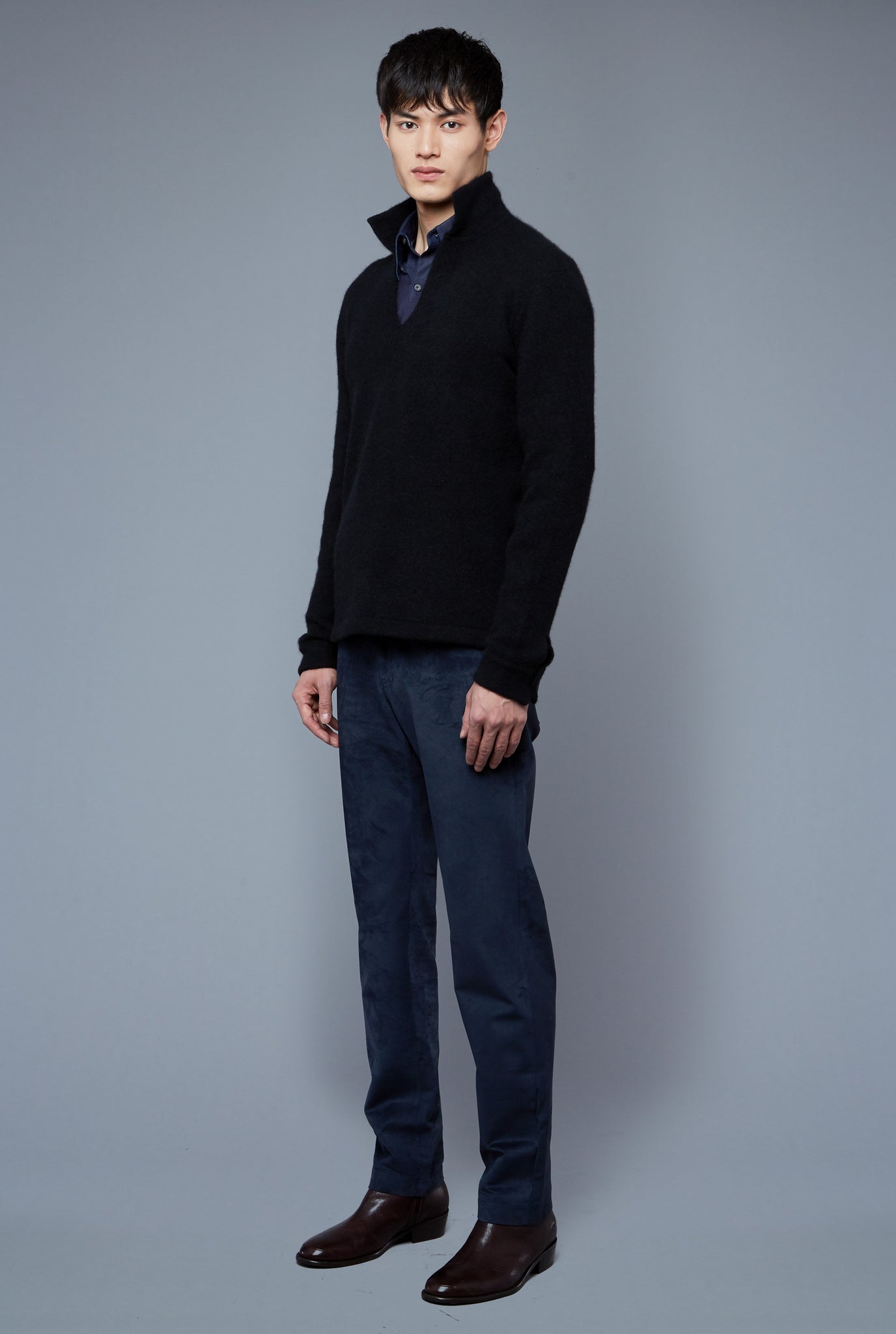 Three Quarter View: Model Qiang Li wearing Cashmere Boucle Sweater