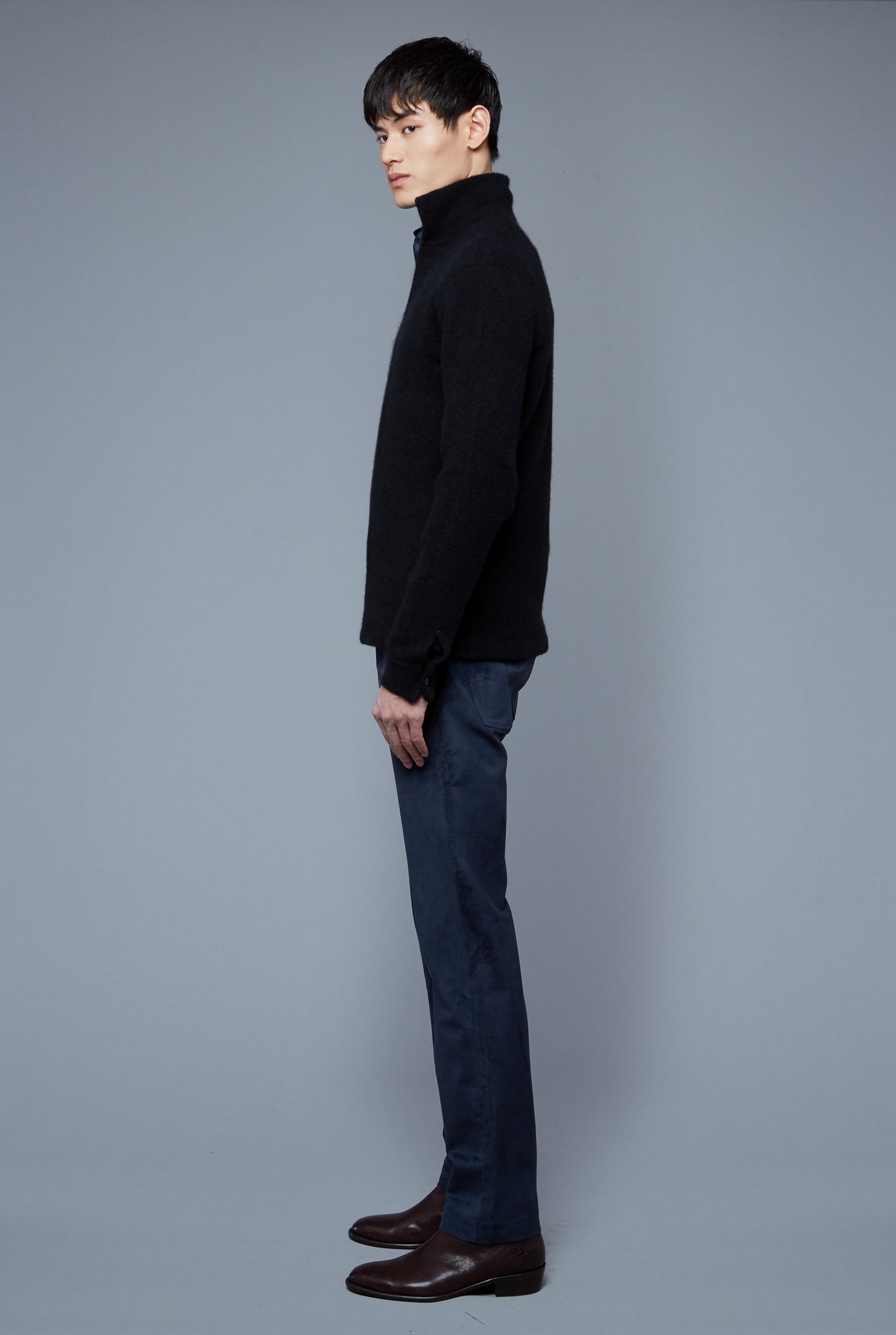 Side View: Model Qiang Li wearing Cashmere Boucle Sweater