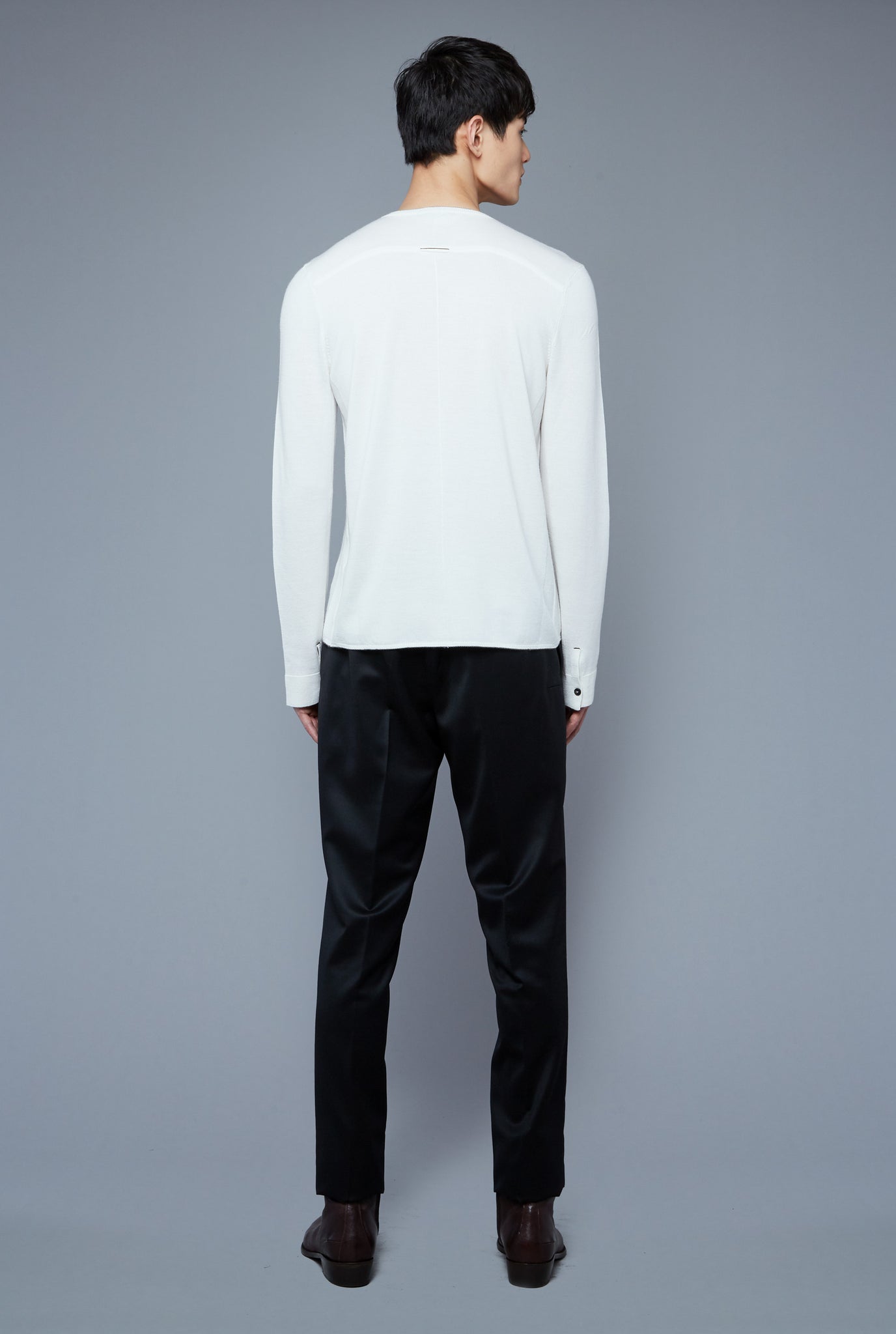Back View: Model Qiang Li wearing Long Sleeve Sweater Tee