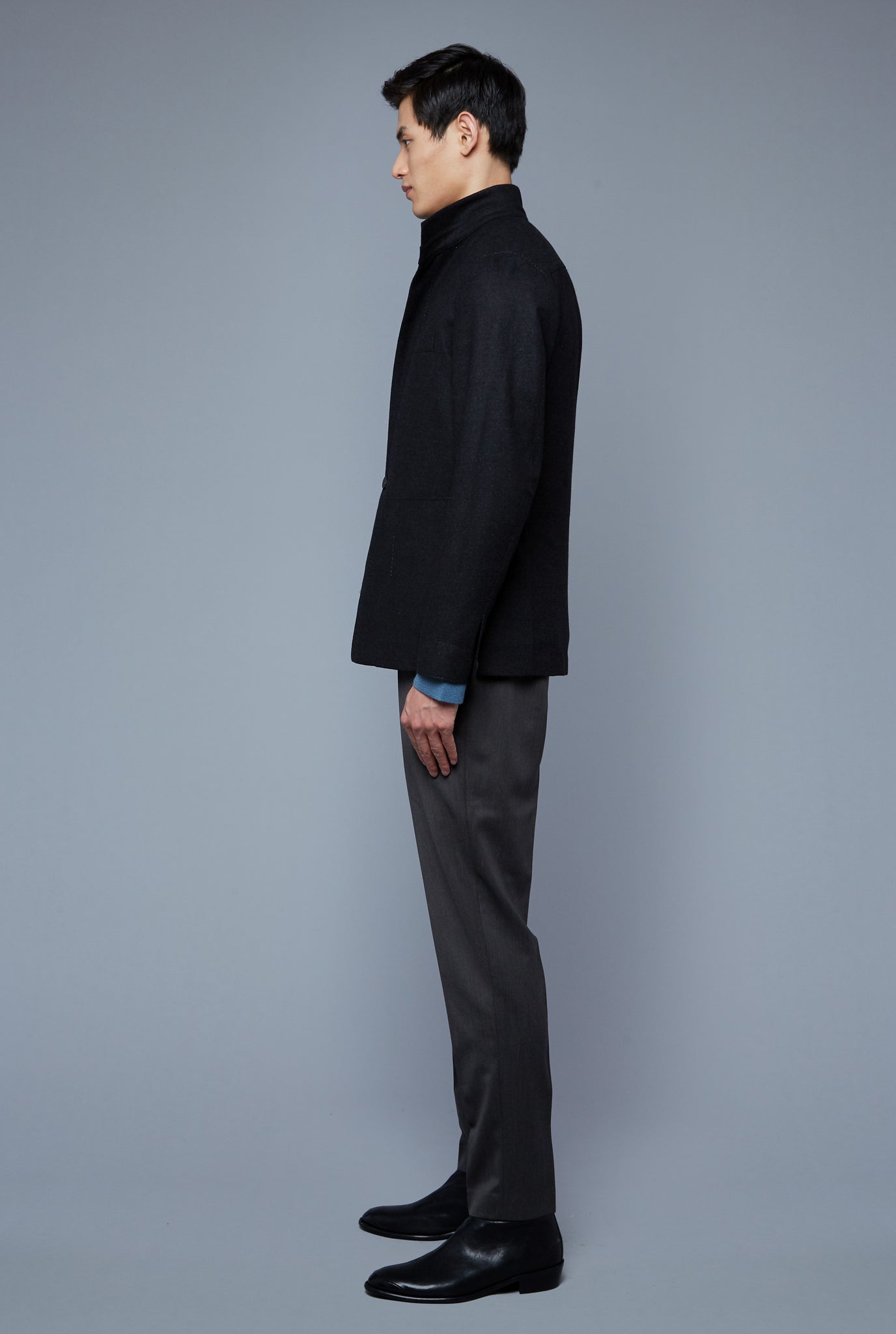 Side View: Model Qiang Li wearing Architect's Jacket