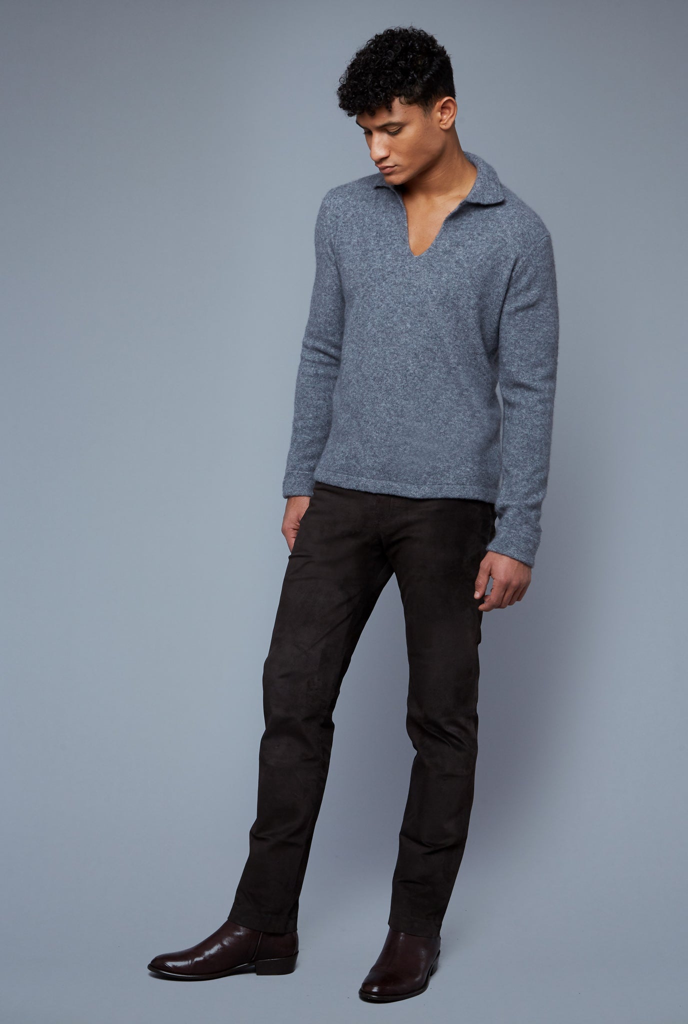 Three Quarter View: Model Tre Boutilier wearing Cashmere Boucle Sweater