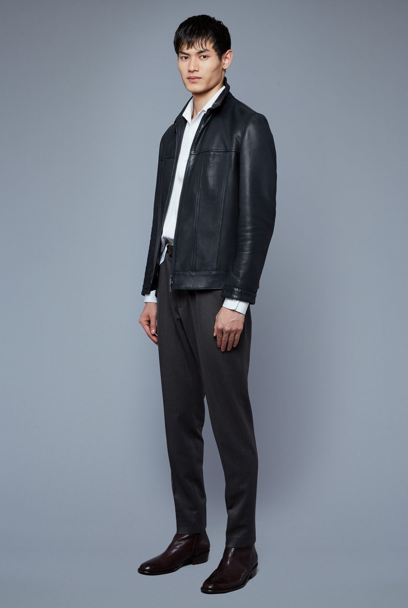 Three Quarter View: Model Qiang Li wearing Leather Supple Jacket