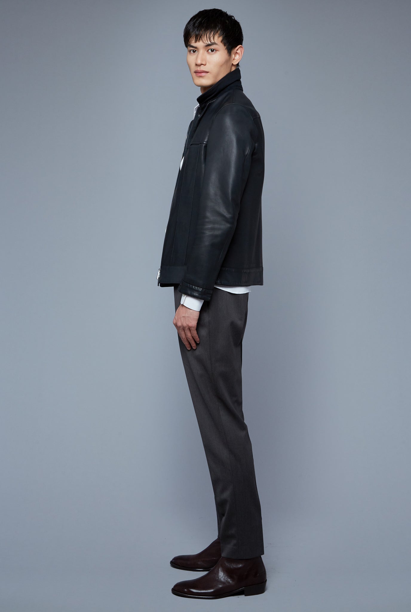 Side View: Model Qiang Li wearing Leather Supple Jacket