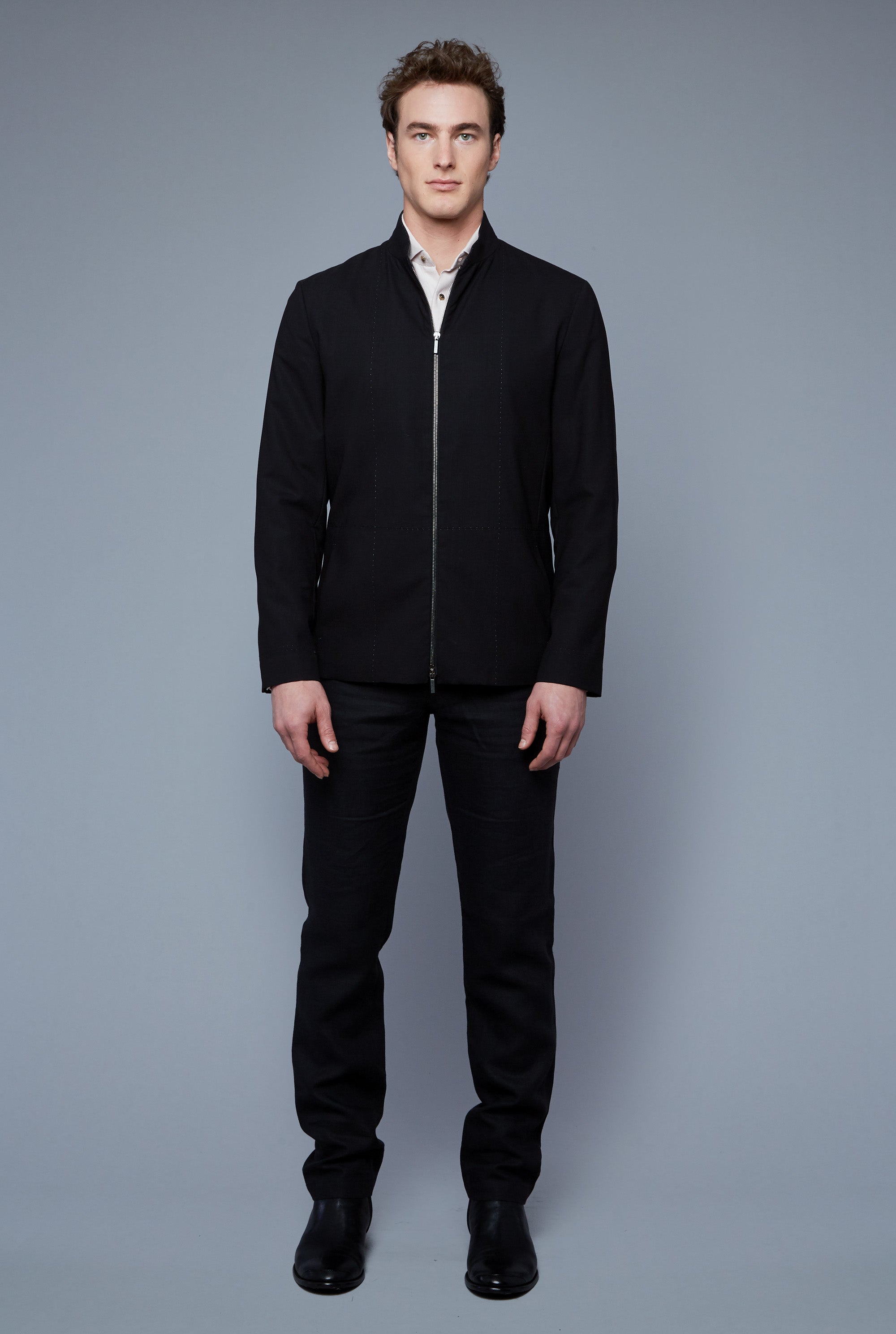 Front View: Model Hans Weiner wearing Seasonless Bomber