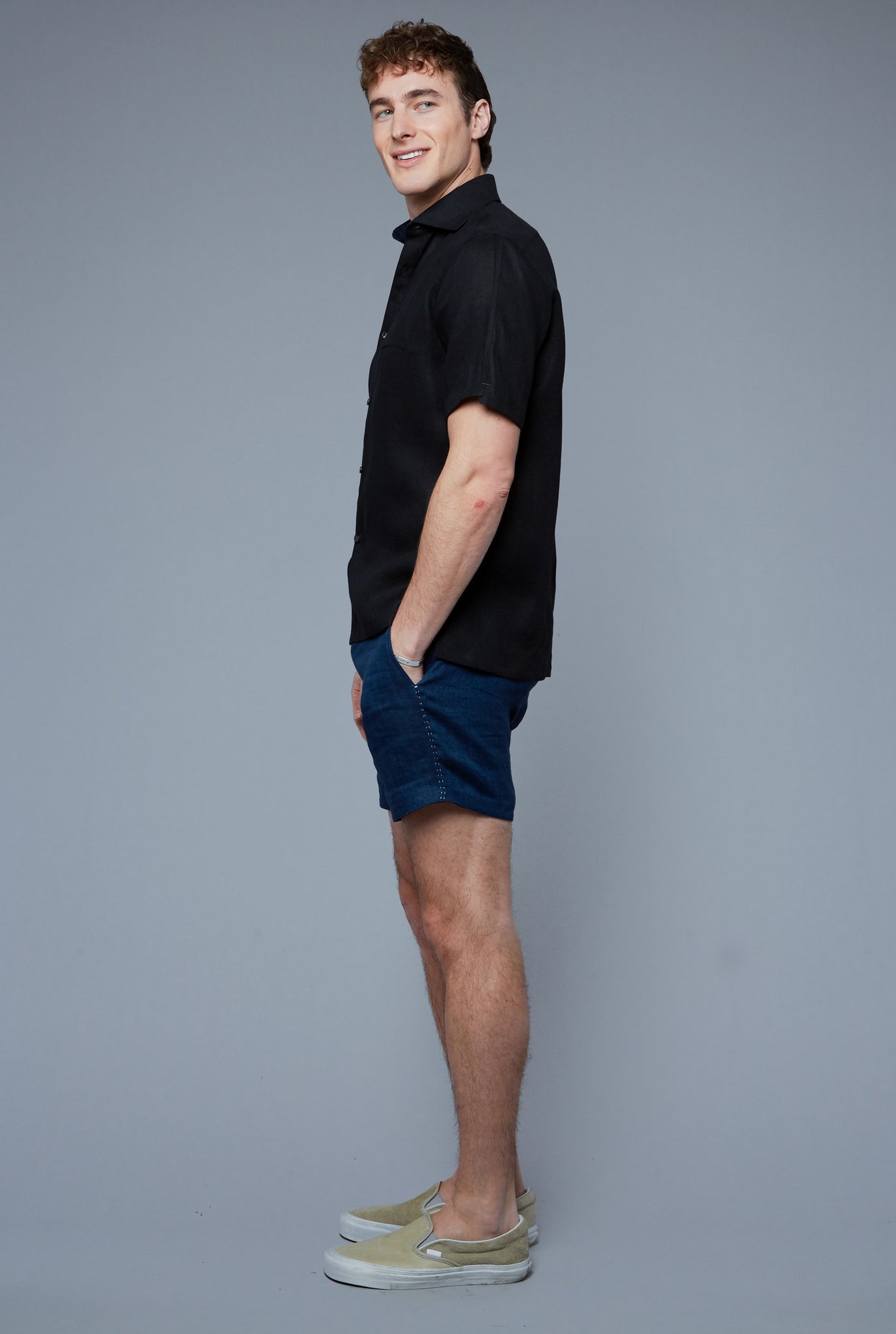 Side View: Model Hans Weiner wearing Aloe Linen Shirt