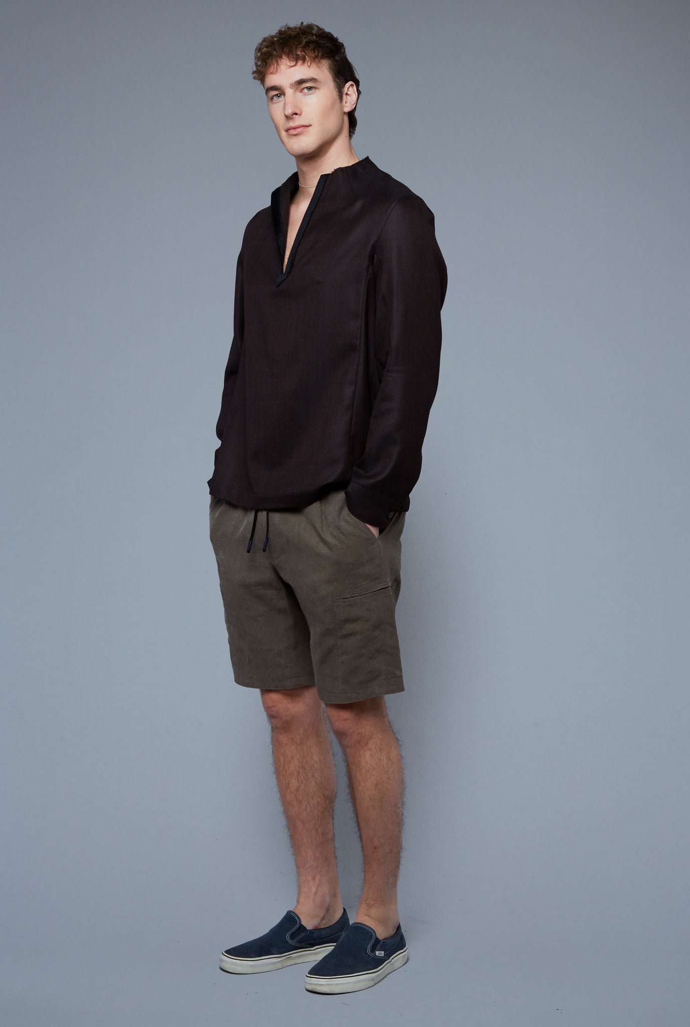 Three Quarter View: Model Hans Weiner wearing Royal Pullover