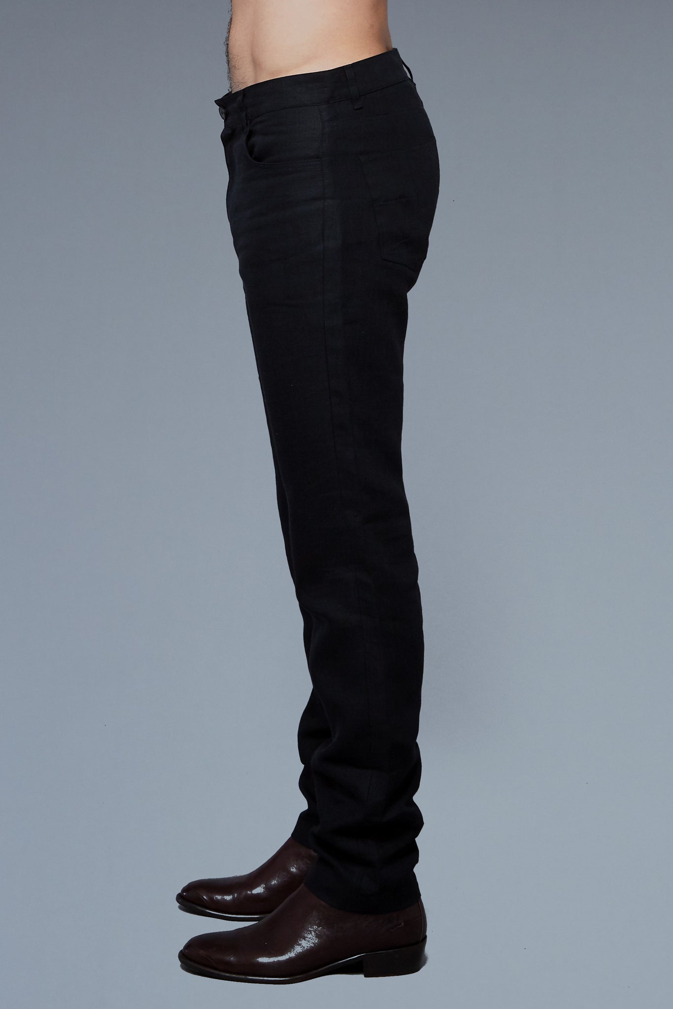 Side View: Model Milos Drago wearing Linen 5 Pocket Pants